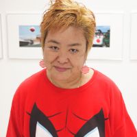 Okinawa-based photographer Mao Ishikawa at her gallery in the city of Okinawa. | COURTESY OF MAO ISHIKAWA, JON MITCHELL
