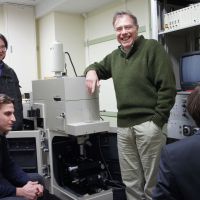 Meeting of minds: Professor Giuseppe Pezzotti and some of his students take a break in his materials science laboratory at Kyoto Institute of Technology. | JANE SINGER PHOTO