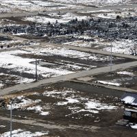 Wrecked cars stacked in a truck near Minamisanriku, Miyagi Prefecture, on Feb. 25, 2012. Catastrophe revisited 12 months on