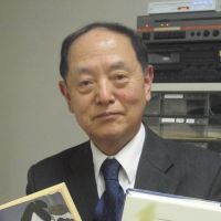 World literature: Academic and Akutagawa expert Yasuyoshi Sekiguchi holds copies of the author\'s works translated into English (left) and Korean. | ERIKO ARITA