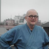 Outward looking: Waku Miller takes in the view from the roof of his home in Tokyo’s Taito Ward. Olympus fiasco was 'lost opportunity'