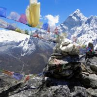 Local color: Cairns and Buddhist prayer flags like these punctuate the trek up to and back from Everest Base Camp. | VICTORIA JAMES