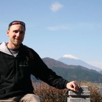 Gardner Robinson poses in Hakone, Kanagawa Prefecture, with Mount Fuji in the background. | COURTESY OF GARDNER ROBINSON