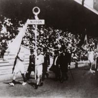 Glory days: Japan\'s first Olympians, Shiso Kanakuri (right) and Yahiko Mishima (holding flag), at the opening ceremony for the Stockholm Games in 1912. | CLIVE FRANCE PHOTOS