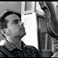 Virtuoso: \"Once you pass a certain point in your violin making, holding a Stradivarius or a fine Italian master make in your own hands, feeling it, looking into it &#8212; that is your best teacher,\" says violin maker and dealer Louis Caporale, who divides much of his time between his two workshops in Tokyo. | MICHAEL DARNTON