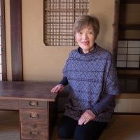 Preserving the past: Sumiko Enbutsu sits next to a suwarizukue writing desk in a room at Yasuda House in Tokyo\'s Bunkyo Ward. | MICHAEL KLEINDL
