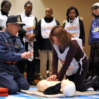 Readying for the worst: Participants in a disaster drill held Jan. 23 by the  Tokyo Metropolitan Government engage in fire extinguisher practice at the Edo-Tokyo Museum in Sumida Ward. | YOSHIAKI MIURA