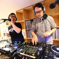 On air: DJ Taku Takahashi (left) and DJ Takeru \"John\" Otoguro man the decks at TCY Radio, an online station based in Tokyo | CHIEKO KATO PHOTO