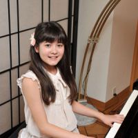 Play us a tune: Budding pianist Umi Garrett stops by The Japan Times to play a tune Tuesday. | YOSHIAKI MIURA