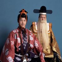 Mansai Nomura (left) plays the sumo wrestler alongside his father, Mansaku Nomura, as the Chinese emperor in popular kyogen drama \"Tojin Zumo (Chinese Sumo.)\" | &#169; YASUHIDE KUGE