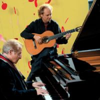 Fusion: Guitarist Lee Ritenour and composer /pianist Dave Grusin will collaborate with the New Japan Philharmonic orchestra. | (C) 2008 Universal Studios. All Rights Reserved.