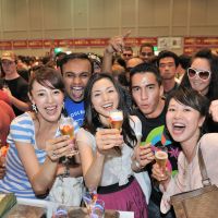 Down the hatch: A group of attendees try out a variety of brews at the 2009 edition of the Great Japan Beer Festival in Yokohama. | KYODO PHOTO