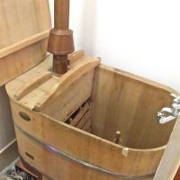 Retro charm: To heat the water for this old-style wooden bath, which was made for early public housing, there is a kama gas heater, at its base. | PHILIP BRASOR