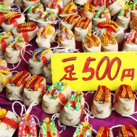 Best feet forward: Lucky clog charms make colorful eye candy on a stall. | ALON ADIKA