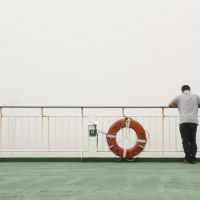 Wist in the mist: An air of detachment enveloped some fellow passengers as the good ship Sun Flower Sapporo (below) sailed northward through fog. People-watching on a ferry in the fog