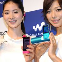 Jams in progress: Models display Sony Corp.\'s latest digital Walkman series, the Android OS-based F800 (left) with a Bluetooth wireless headphone, and an S770 series MP3 player with a speaker and FM radio recharging cradle in Tokyo on Thursday. | AFP-JIJI