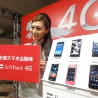 Quicker connection: Softbank Corp. shows off its new smartphones, which will use the Softbank 4G network, during a press event in  Tokyo on  Tuesday. | KAZUAKI NAGATA