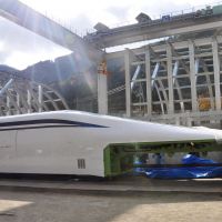Ready to levitate: The new L0 series maglev train is transferred to a test facility yard Thursday in Tsuru,Yamanashi Prefecture. | KYODO