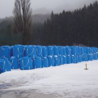 Chemistry project: Containers filled with contaminated soil are piled up on the grounds of a junior high school in the village of Kawauchi, Fukushima Prefecture, on Feb 23. | MIZUHO AOKI