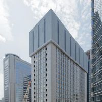 This sequence shows a 105-meter building being systematically razed in Tokyo last year using Taisei\'s eco-friendly Tecorep method. courtesy of taisei corp. | SATOKO KAWASAKI