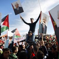 Hero\'s welcome: Palestinians gathered in the West Bank city of Ramallah on Sunday hold pictures of President Mahmoud Abbas as they celebrate their recent successful bid to win U.N. statehood recognition. | #### NO #### NO CAPTIONS FOUND FOR THIS FILE (p6 Abbas 20121204) #### S FOUND FOR THIS FILE (P6 ABBAS 20121204) ####