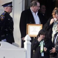 Teacher mourned: Family and friends leave the wake of Victoria Soto, a teacher at Sandy Hook Elementary School, in Stratford, Connecticut, on Tuesday. | AP