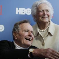 Full circle: Former President George Bush and his wife, Barbara, arrive for the premiere of an HBO documentary about his life in Kennebunkport, Maine, in June. | AP