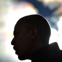 Black power: President Barack Obama is silhouetted during a campaign rally speech in Concord, New Hampshire, in November. | AFP-JIJI