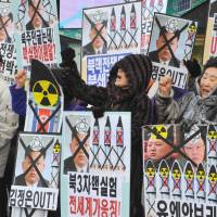 Testing times: Activists from an anti-North Korea group protest in Seoul on Tuesday against Pyongyang\'s latest nuclear test. | AFP-JIJI