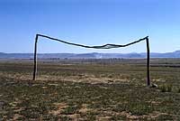 Goalposts in Nqutu, South Africa (above) photographed by Neville Gavle; Alistair Berg turns his lens on fans, like these Scotland supporters (below) Celebrate football's field of dreams