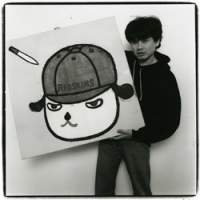 Shigeo Anzai\'s photograph of Yoshitomo Nara in Tokyo on January 29, 1996. To see more of his shots of artists, visit The Japan Times online. | &#169; ANZAI