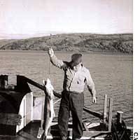 The engineer of the M.V. Radium Gillbert with one of the lake\'s renowned huge pike thet he lended. | PHOTOS COURTESY OF THE ISAMU NOGUCHI FOUNDATION AND GARDEN MUSEUM/ARS, NEW YORK/SPDA, TOKYO (C) 2005 AND KATE THOMPSON PHOTOS