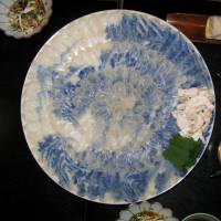 Clear favorite: Fugu meat is most often eaten as sashimi, and the artistically arranged platter of translucent slices here, known as usuzukuri, would serve several people at around &#165;5,000 per head.   | JEFF KINGSTON