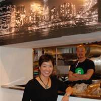 Owner Suji Park stands proud at her restaurant Suji\'s, as manager Kyu Chah looks on from the kitchen; the spicy Mexican scrambled eggs with chorizo and salsa (below) are a popular staple with the all-day brunch crowd. | ROBBIE SWINNERTON
