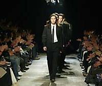 Models parade down the runway during the finale of the MajiMaji fair/winter 2004/05 show by noted menswear designer Rynshu Hashimoto. Hanging by a thread