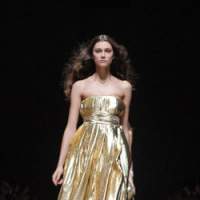 One of the rising stars of JFW; Osaka-born Han Ahn Soon\'s runway return featured stunning evening dresses. | AP PHOTO