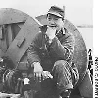 \"Fisherman, 1973\" was taken by Robert Minden as part of a series of photographs of the Japanese-Canadian fishing community in Steveston. The photographs were paired with poems by Daphne Marlatt in the 1974 book \"Steveston,\" which has been hailed as a Canadian classic. | PHOTO COURTESY OF KOMATSUZA