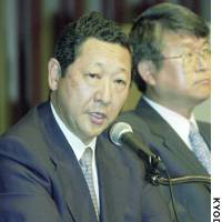 Takashi Goto, president of Seibu Railway Co., announces plans to set up a holding company for the corporate conglomerate at a news conference Wednesday in Tokyo. | HIROKO NAKATA PHOTO