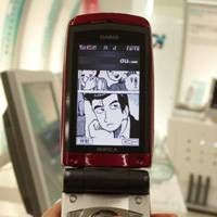A scene from the popular cartoon strip \"Oishinbo\" is shown on a cell phone display. | (c) TETSU KARIYA AND AKIRA HANASAKI/SHOGAKUKAN INC./TAIGA URANAKA PHOTO
