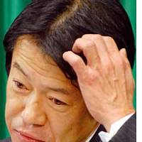 Farm Minister Shoichi Nakagawa pauses during a news conference at the ministry on Tuesday. | YONHAP/KYODO