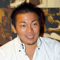 Teppen president Keisuke Ohshima gives an interview Aug. 2 at his Shibuya Izakaya. | AP PHOTO
