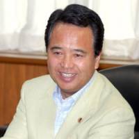 Akira Amari, who was reappointed minister of economy, trade and industry in the Aug. 27 Cabinet reshuffle, speaks during a recent interview at his ministry. | YOSHIAKI MIURA PHOTO
