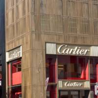 The newly renovated exterior of Cartier\'s outlet in Tokyo\'s Ginza glitters in the sun after its unveiling Wednesday. | SATOKO KAWASAKI PHOTO