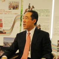 Henry Tang, chief secretary of the administration of the Hong Kong Special Administrative Region, speaks Tuesday at the Hong Kong Economic and Trade Office in Chiyoda Ward, Tokyo. | REIJI YOSHIDA PHOTO