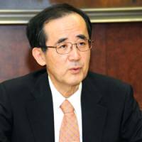 In the money: Bank of Japan Gov. Masaaki Shirakawa faces reporters Friday at the BOJ building in Tokyo. | SATOKO KAWSAKI PHOTO