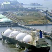 Liquid asset: A tanker carrying liquefied natural gas from Russia\'s Sakhalin-2 project arrives at a receiving terminal operated by Tokyo Gas Co. and Tokyo Electric Power Co., in Sodegaura, Chiba Prefecture, on Monday. | KYODO PHOTO