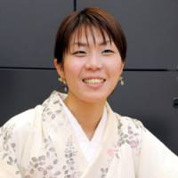 Good fit: Eri Kikunaga, president of pierced earring clasp maker Chrysmela, talks about her business at her office in Chiyoda Ward, Tokyo, in June. | SATOKO KAWSAKI PHOTO