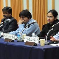 Journalists and experts from India (from left) Rajeev Anantaram, Jayanta Roy Chowdhury, Prakash Nanda, Vidhi Upadhyay and Rajaram Panda discuss India\'s deepening ties with East Asian economies during a symposium held Sept. 15 at Keidanren Kaikan in Tokyo. | SATOKO KAWASAKI