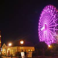 Light site: A Ferris wheel illuminated with 70,000 LED lights overlooks the Huis Ten Bosch theme park in Sasebo, Nagasaki Prefecture. | KYODO