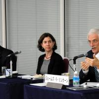 Bruce Klingner (left) of the Heritage Foundation discusses Japan-U.S. relations while Meredith Broadbent from the Center for Strategic and International Studies listens during the symposium. U.S. 'quietly' frustrated with ongoing Tokyo inaction on key policy issues